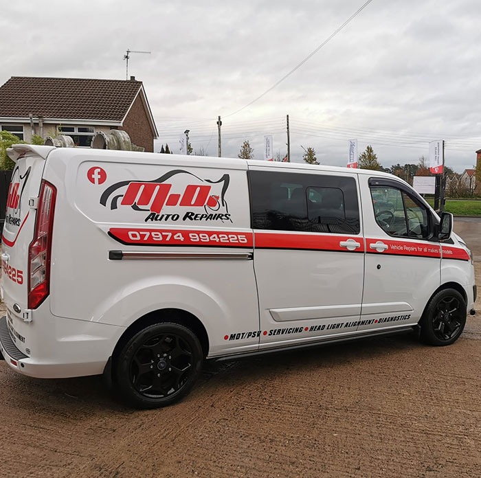 M.O. Auto Repairs workshop and van