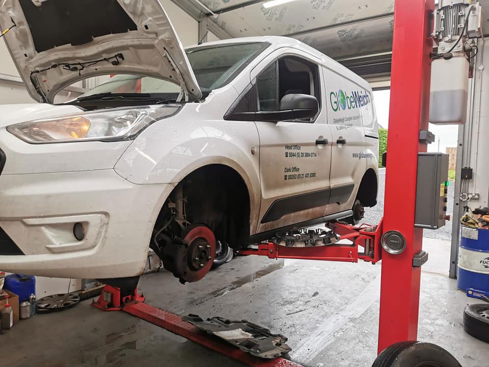 Hydraulic lift in M.O. Auto Repairs workshop